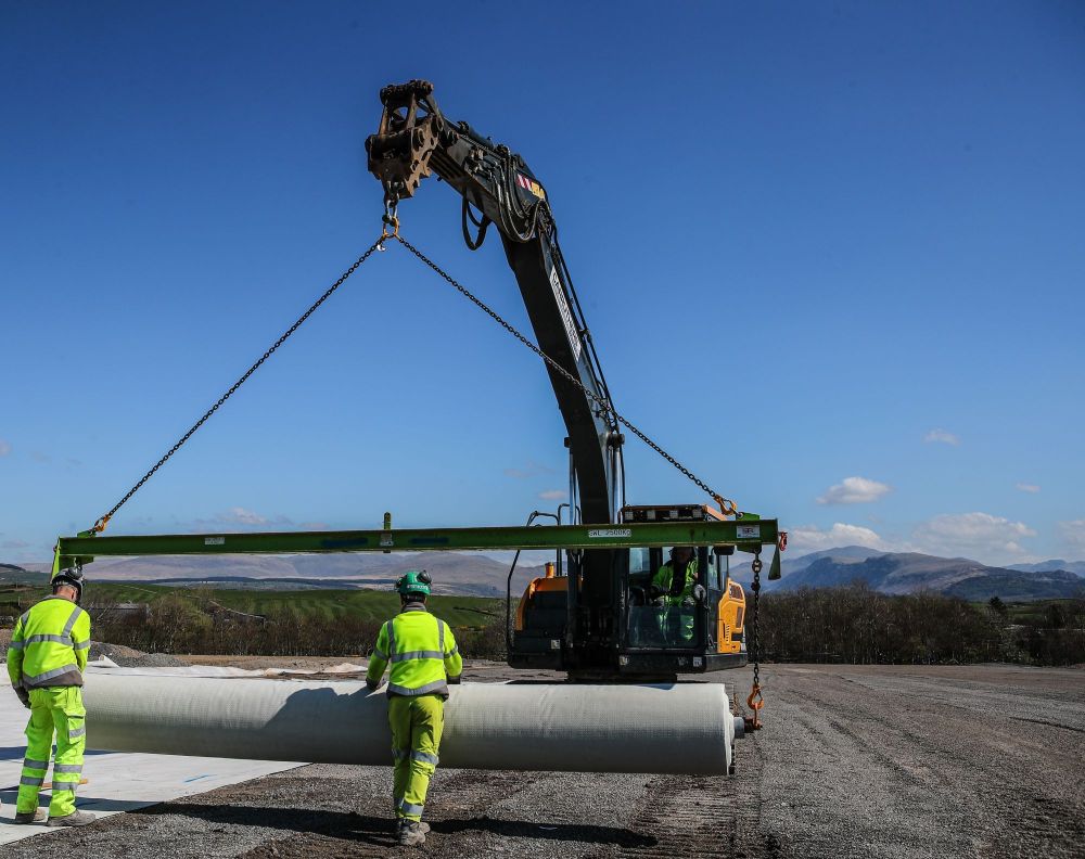 Laying the Geosynthetic Clay Liner at the Repository site
